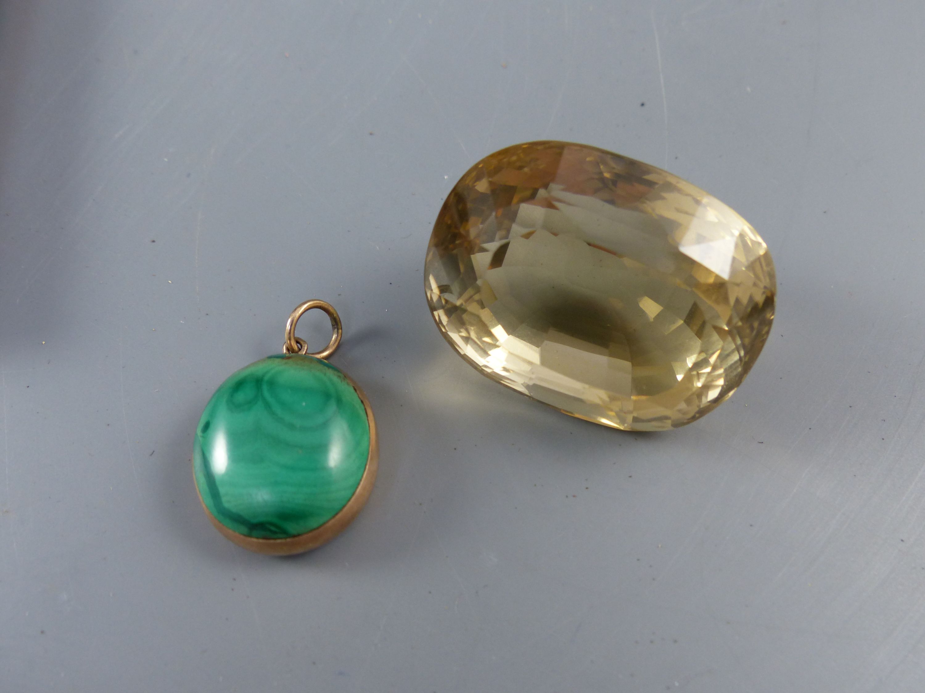 A yellow metal mounted malachite and plaited hair oval pendant, 21mm, gross 6.4 grams, citrine & 2 paste necklaces.